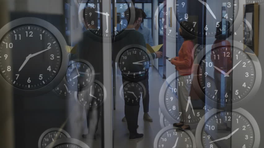 Animation of moving clocks over diverse colleagues discussing work in office. Business and digital interface concept digitally generated video. - Powered by Shutterstock - Get 15% off with code: PIKWIZARD15