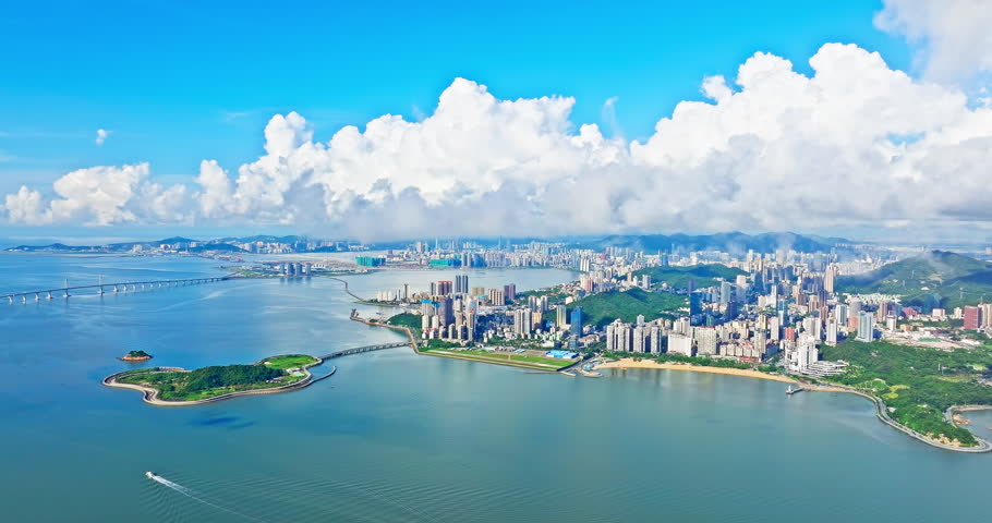 Aerial shot of sea and mountains natural landscape and city skyline in Zhuhai