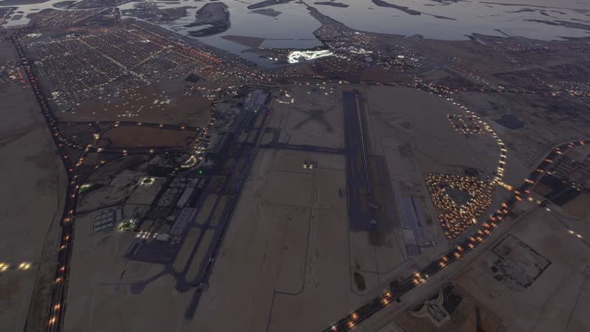 3D - Top night aerial view of Zayed International Airport in Abu Dhabi. United Arab Emirates
