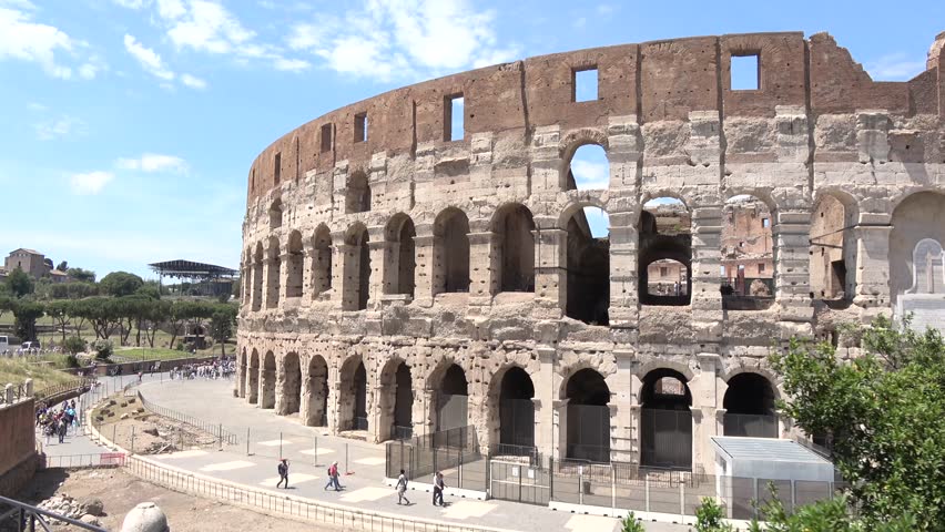 Footage of Colosseum or Coliseum also known as the Flavian Amphitheatre in Italian Anfiteatro Flavio or Colosseo is an oval amphitheatre in the centre of the city of Rome Italy beautiful summer day 4k Royalty-Free Stock Footage #34721422