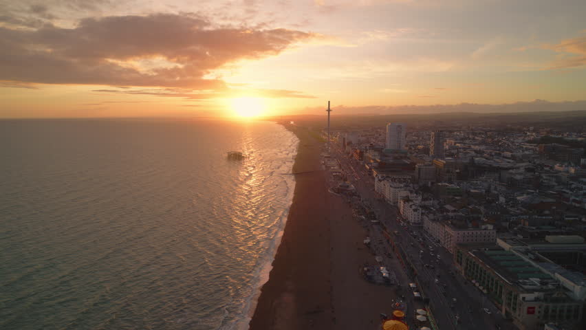 Super Sunset, T Shaped Light, Establishing Aerial View Shot of Brighton UK, Brighton and Hove, England United Kingdom, sunset, golden hour Royalty-Free Stock Footage #3472164965
