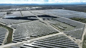 Aerial drone view of a solar power plant that is producing clean and sustainable energy in Italy. - Powered by Shutterstock - Get 15% off with code: PIKWIZARD15