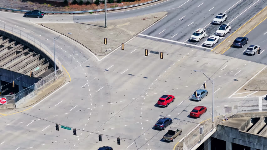 Slow Traffic Along Intersection Roads With Multi Lanes In The City Of Atlanta, Georgia, United States. Aerial Shot Royalty-Free Stock Footage #3472352031