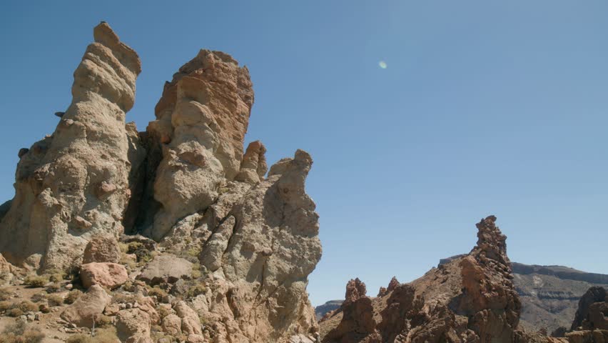 Volcanic rock formations in barren ladscape in Los Roques de Garcia, Teide National Park in Tenerife, Canary Islands in spring
