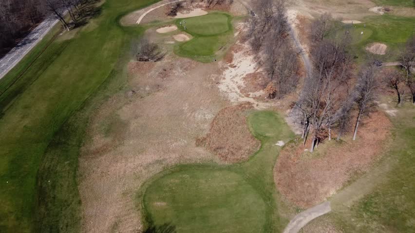 Spring's embrace on golf's canvas.