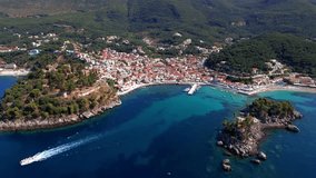 Greece travel and scenic polaces. Aerial drone video of Parga colorful town and popular tourist resort in Epirus