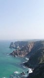 Vertical Video of Atlantic Ocean Coastline. Sea Cliff Aerial View