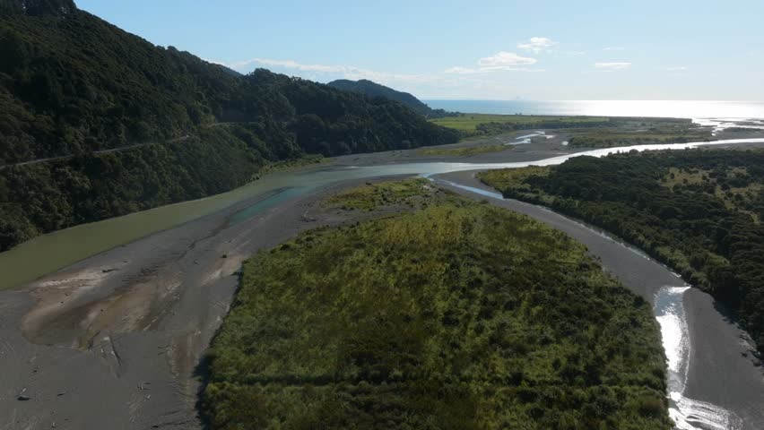 Winding river come deep from hills. Raukokore River, Raukokore, Bay of Plenty, New Zealand.  