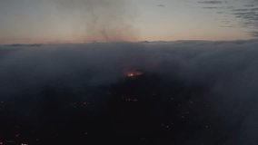 Aerial view in fog over the volcano in Iceland with lava field, eruption litli hrutur Iceland