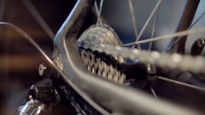 Cyclist On Bicycle Drivetrain System Chain Rotating. Gear System 
Bike Wheel. Cycling Drivetrain Derailleur Chain Cassette Spokes. Cyclist Chain Gear Shifting. Cycling Cranckset Bike Wheel Gearshift Royalty-Free Stock Footage #3472901115