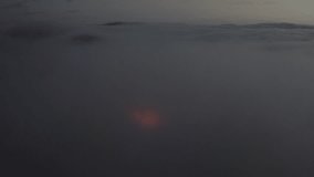 Aerial view over morning clouds in Iceland with lava field, eruption litli hrutur Iceland