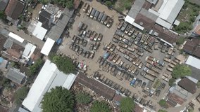 bird's eye view of the cattle truck parking. view of the cattle market from a drone	 - Powered by Shutterstock - Get 15% off with code: PIKWIZARD15