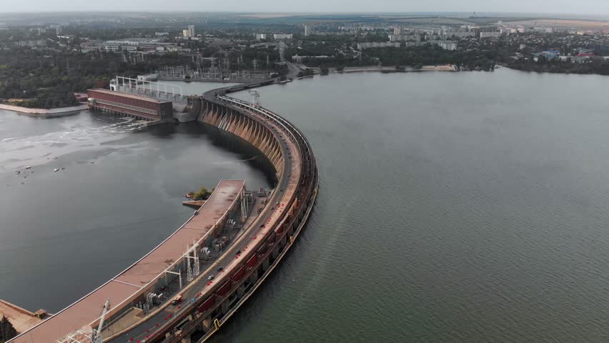 A beautiful view from above of the largest hydroelectric power plant in Ukraine - the Dnieper Hydroelectric Power Station. Dneproges before the shelling of Russian troops. Top view city of Zaporozhye.