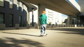 Male skateboarder training in urban car parking area - Powered by Shutterstock - Get 15% off with code: PIKWIZARD15