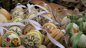 Hand-painted Easter eggs, decorated with ribbons, in a festive design. Vienna Easter Fair - Powered by Shutterstock - Get 15% off with code: PIKWIZARD15