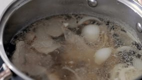 Master Filipino Tinola soup! This video guides you through making this flavorful chicken, papaya  malunggay (moringa) dish. Perfect for stock footage