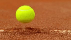 Super Slow Motion of Hitting Tennis Ball on Line. Low Depth of Focus. Filmed on High Speed Cinema Camera, 1000fps. - Powered by Shutterstock - Get 15% off with code: PIKWIZARD15