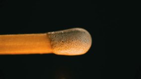 First-person view: Igniting match with vibrant blue flame. Handheld camera captures fiery moment