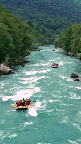 Whitewater Rafting Aerial View - People in Inflatable Rafts Paddling Through River Rapids. People Enjoying the Rafting Adventure. Active Vacations. Picturesque Canyon with Mountains, Forest and River.