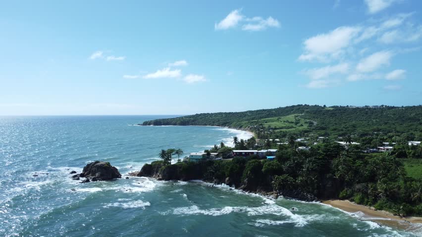 Static Aerial Drone Shot over Caribbean Beach with Crashing Waves from Playa El Negro in Ceiba, Puerto Rico. 