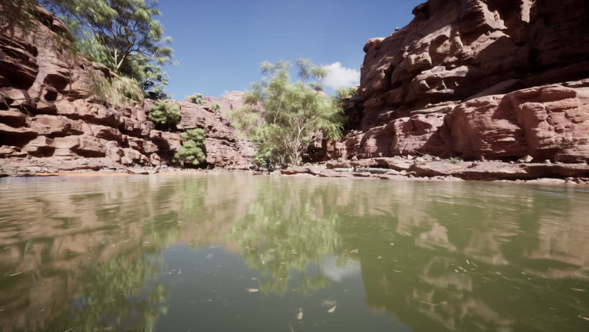 landscape with red sandstone rock and river Royalty-Free Stock Footage #3473501243