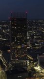 Vertical Video of Manchester, Vertical Aerial View Shot, night, evening