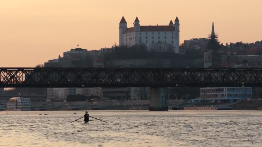 Danube river with castle and kayaker in Bratislava, Slovakia