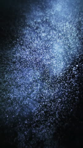Abstract Blue Particles In Motion, Space Background. Vertical video.