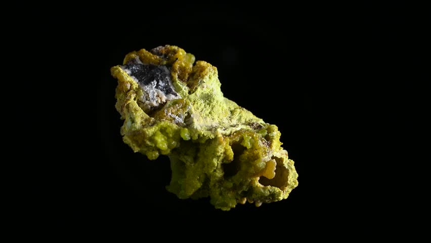 Green pyromorphite (lead chlorophosphate) sample rotating slowly against a black background.