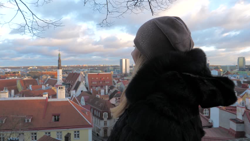 On The Lookout Woman Looking Around At The Panorama Of The Beautiful Old Town