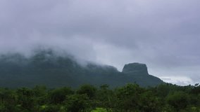 This is a timelapse of monsoon storm clouds over a mountain in the Sahyadris. 4K ultra HD for the clearest video experience.