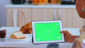 Searching Recipe, Table Computer with Green Mockup, Experience the convenience of digital resources in the kitchen with animations depicting individuals searching for recipes on table computers