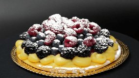 Fruit tart with custard and fresh strawberries.
Presentation of the shortcrust pastry cake and berries.. - Powered by Shutterstock - Get 15% off with code: PIKWIZARD15