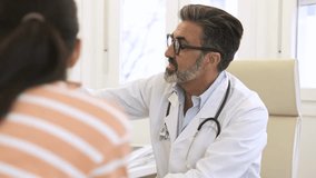 Doctor and patient discussing health problems - Powered by Shutterstock - Get 15% off with code: PIKWIZARD15