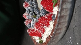 Fruit and berry tart with cocoa crust and milk vanilla cream - vertical - Powered by Shutterstock - Get 15% off with code: PIKWIZARD15