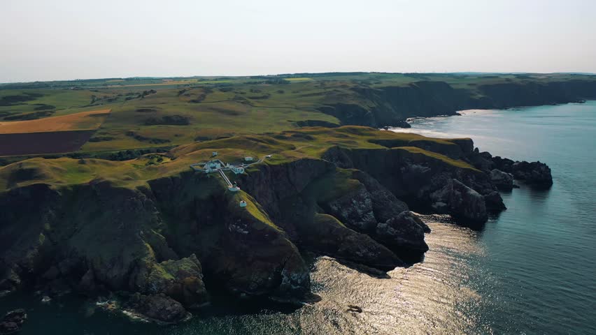 Aerial Adventure Over Scottish Cliffs: The Beauty of St Abbs Lighthouse, Iconic Scottish Scenery, Scotland.