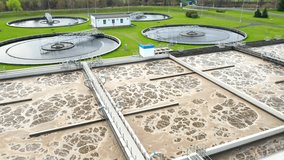 Sewage treatment plant from above. Grey water recycling. Waste management theme. Ecology and environment in European Union. - Powered by Shutterstock - Get 15% off with code: PIKWIZARD15