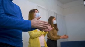 People clap in masks. Group of Patients in medical masks applaud, greeting doctors, people are isolated at home coronavirus. Solidarity movement people corporate group. People medical protection masks - Powered by Shutterstock - Get 15% off with code: PIKWIZARD15