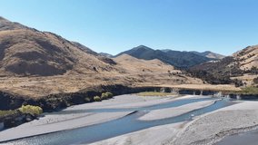 Drone video New Zealand's raw landscape: blue streams, green hills