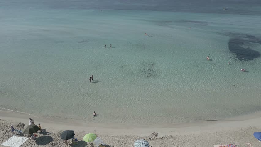 Aerial view of Punta Prosciutto beach, Porto Cesareo, Lecce, Puglia, Italy, 4K, 60fps, cinelike