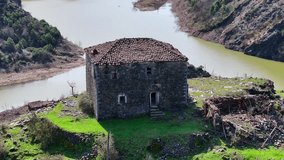 Aerial video of a hysterical fortified house build on the top of a rocky hill over 200 years ago in a remote village of northern Albania called Bukmire (in Mirdita region)  