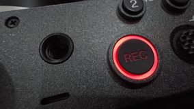 REC button lights up on camcorder to indicate start of recording. Then it turns off and goes out. Extreme close-up. - Powered by Shutterstock - Get 15% off with code: PIKWIZARD15
