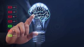 A symbolic human brain inside a light bulb in which the light turns on and off and which a businessman finger points to. New technologies in medicine and AI. Cg - Powered by Shutterstock - Get 15% off with code: PIKWIZARD15