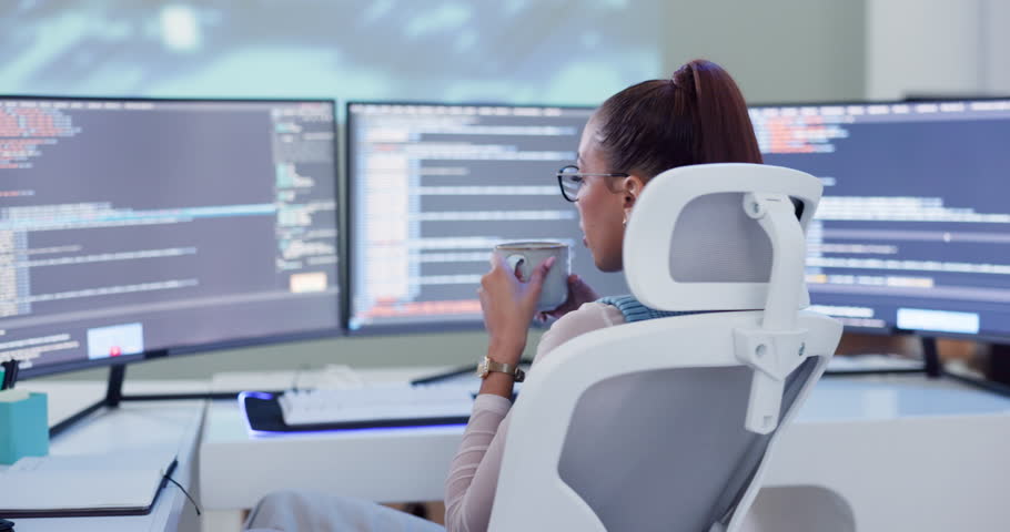 Programmer, coffee and technology with software, coding and web 3.0 project in office. Woman, cyber security and data for corporate, professional and ux computer technician with workplace break
