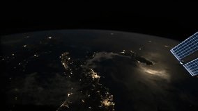 Earth from space. Time lapse of over the Earth seen from the International space station. Space exploration of planet Earth at night. Elements of this video furnished by NASA.