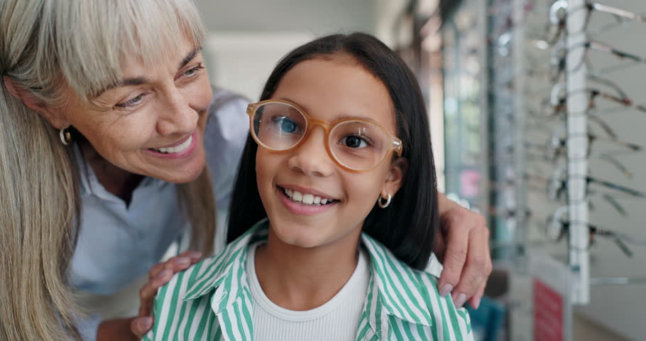 Shopping, glasses or face of child with doctor for eye care, retail and vision for help or choice. Woman, kid or portrait of girl with optician or lens for new frames or optometry for prescription