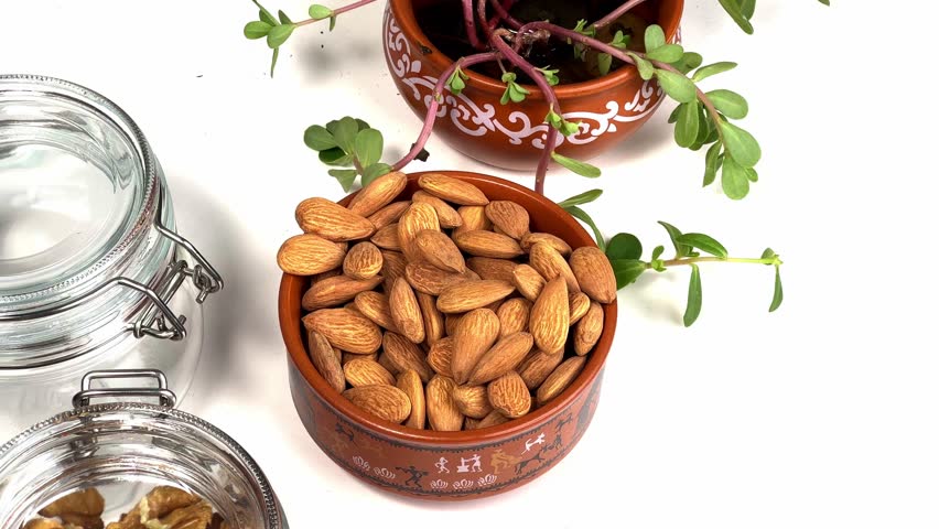 Nut almond close up. product rich in minerals and vitamins. Almond turns in a shot