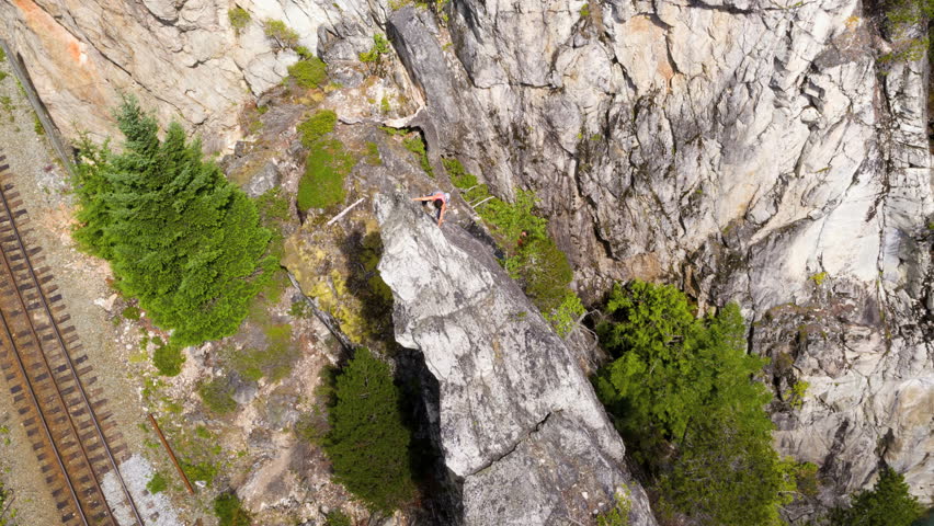 Aerial drone of climbing team expedition roped together on the rocky extreme wall in Squamish Valley Canada