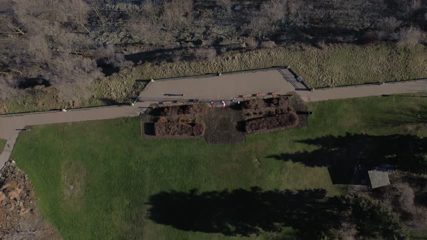 Drone video birds eye view moving over the mountain brow towards downtown Hamilton Ontario