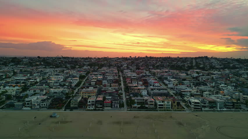 Manhattan Beach, California, USA - A Beautiful Sight of Coastal Residences at Sunset - Aerial Panning Shot
